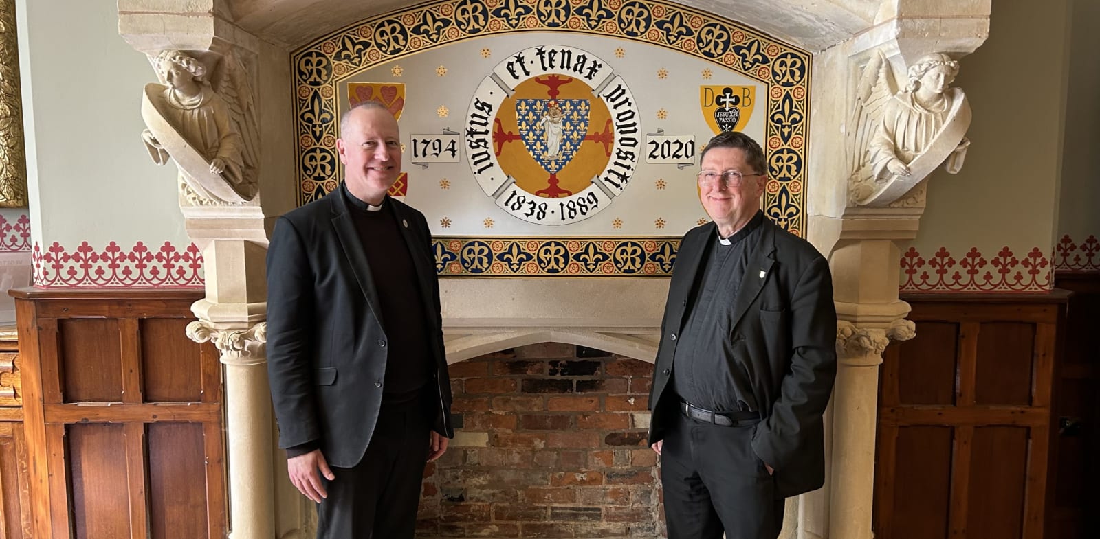 Fr Michael Cullinan and Canon Michael Dolman at the front door of St Mary's College, Oscott